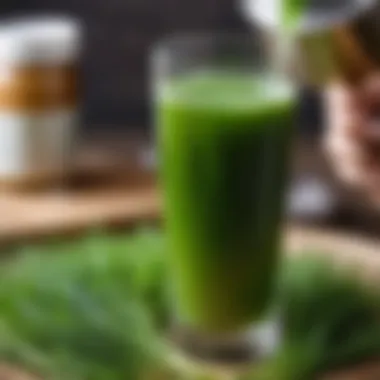 A close-up of barley grass being blended into a drink