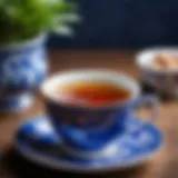 A vibrant blue tea in a delicate porcelain cup, showcasing its rich color and texture.