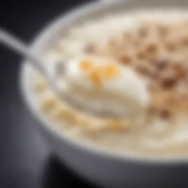 A close-up of a spoonful of milk-based porridge showcasing its creamy texture