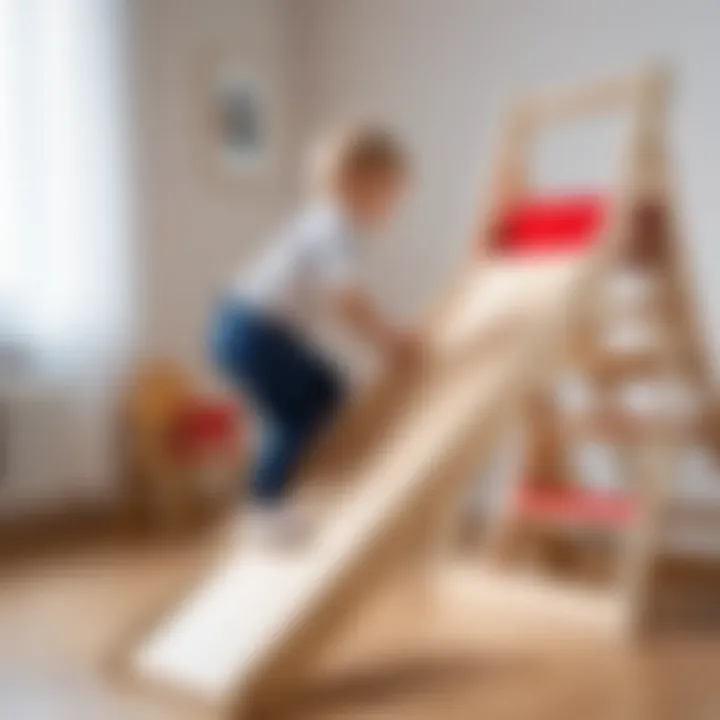 Child climbing the Pikler triangle with slide