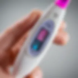 Close-up of a digital pregnancy test showing a positive result.