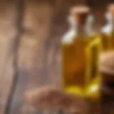 Bottles of golden flaxseed oil on a wooden table