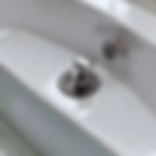 Close-up of a bathtub drain showing a stuck plug