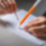 Removing highlighter marks from a piece of paper with a cotton swab.