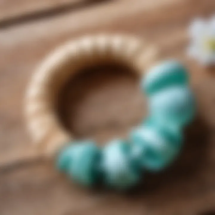 A soothing teething ring made from natural materials, designed for infants.