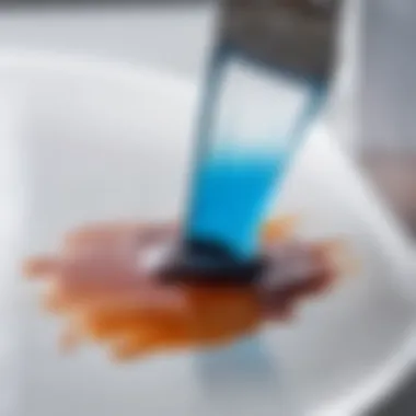 Close-up of a stain being treated with a laundry gel.