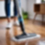 Steam mop in action on hardwood floor