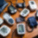 A variety of blood pressure monitors displayed on a wooden table