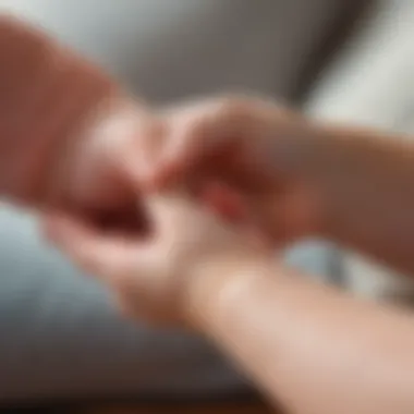 A close-up of a baby's hand grasping a parent's finger.