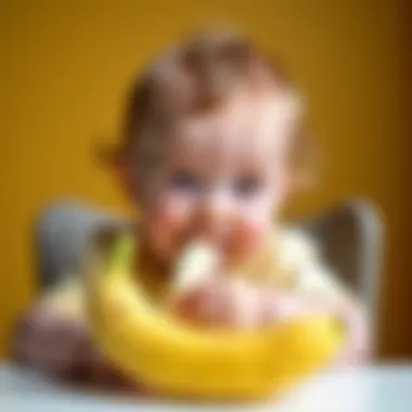 A curious baby exploring a banana in a nibble feeder