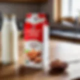 A carton of almond milk placed on a wooden kitchen table